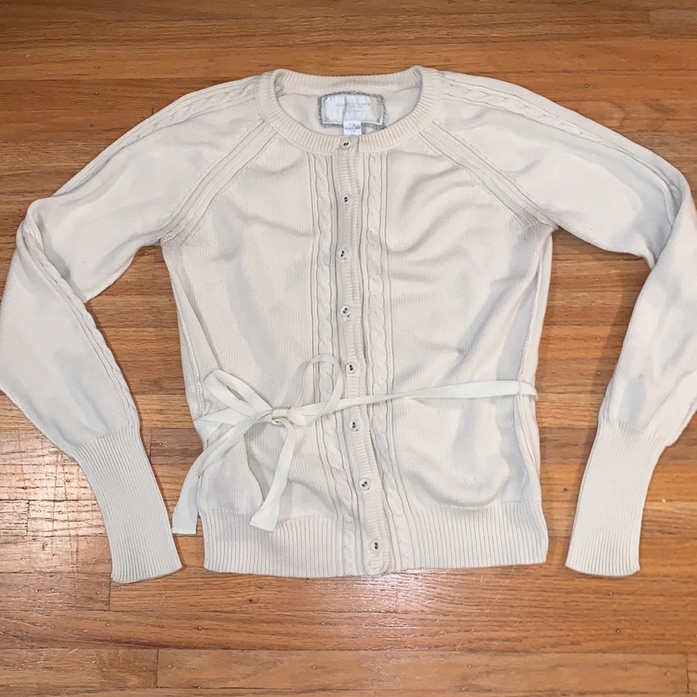 Women’s cardigan with bow accent